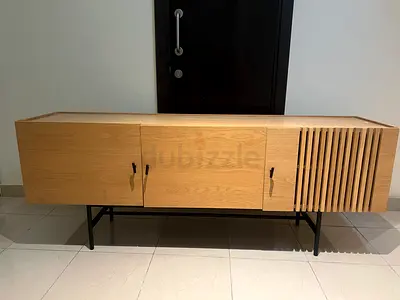 Stylish Wooden TV table with Slatted Design