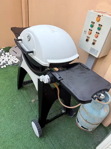 Outdoor Weber BBQ Grill with the gas bottle