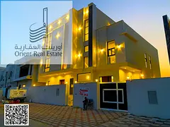 Villa for sale in Ajman, Al Helio 2 area. The villa consists of 6 master bedrooms, a majlis (formal