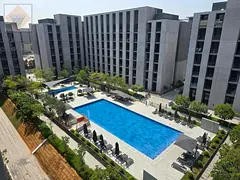 Stylish Smart Home 1BR in Tiraz Aljada | Furnished, Private Balcony, Pool View