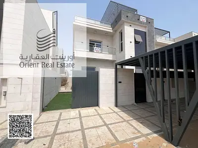 Villa for sale at Ajman Al Helio 2  area on the corner , 5 Master Room , Majlis, Hall , Maid Room , Kitchen , Freehold for all nationalities