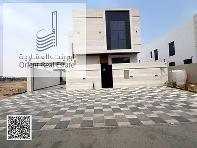 Villa for sale at Ajman Al Helio 2  area on the corner , 5 Master Room , Majlis, Hall , Maid Room , Kitchen , Freehold for all nationalities