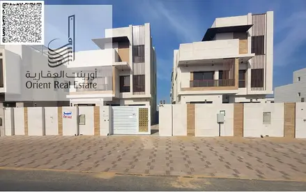 Villa for sale in Ajman at Al Bahia The villa is G+1+Roof Majlis, 2 Hall, 5 Master Rooms, Fountain, Big kitchen, Maid Room, Pantry, And Garden,