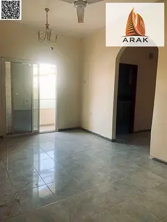 A 2 bedroom apartment with a living hall, 2 bathrooms, and a balcony is available for annual rent in