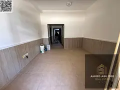 Elegant 1BR in Al Rawda 2: master bedroom, 2 baths, balcony w/ open view, split AC, built-in wardrob