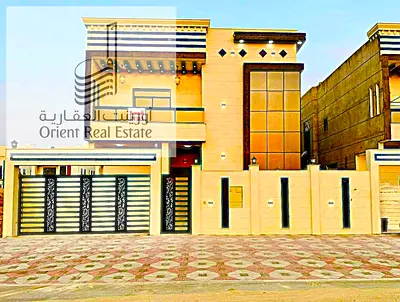 فيلا للبيع بعجمان منطقة الباهية شاملة المكيفات المركزية مكونة من 5 غرف نوم ماستر ومجلس وصالة وباركينج داخلي وخارجي تملك حر لجميع الجنسيات .