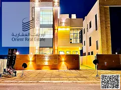 Villa for sale in Ajman, Al Helio 2 area, with a swimming pool, including registration and ownership