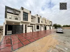Corner villa for sale in Ajman, Al Yasmeen area. Includes registration fees. 5 master bedrooms, majl