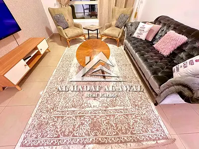 Al Khan area, Rose Building, next to Al Khan Corniche, opposite Al Tarboush Syrian Restaurant. Two bedrooms and a living room with a sea view. Ample s