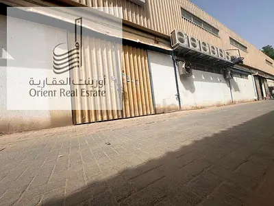 Warehouse for sale in Ajman, Emirates Industrial City, excellent location, Block 3, on the main road.