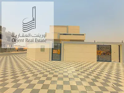 Villa for sale in Ajman, Al Helio 1 area, freehold for all nationalities. The villa consists of 1+G, a large hall, a large kitchen, and 3 master bedro