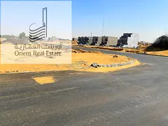 Land with street and alley for sale in Al Zahia, Ajman, residential investment G+2, directly opposit