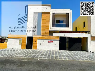 Villa for sale in Ajman, Al Bahia area, including registration and ownership fees, 5 master bedrooms with a modern kitchen and pantry with indoor and