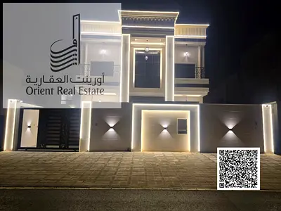 Villa for sale in Ajman, AL Helio2 The Villa is G+2 , Majlis , hall , 6 master rooms , maid room big kitchen , pantry , roof .