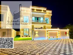 Villa for sale in Ajman, Al Zahiyah area. The villa consists of 5 master bedrooms, a majlis, 2 livin