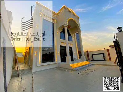 Villa for sale in Ajman, Al Helio 2 area. The villa consists of 5 master bedrooms, a majlis (formal sitting room), a living room, and a maid's room. F