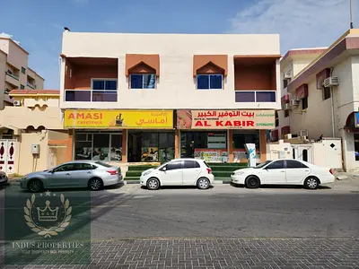 مبنى تجاري وسكني للبيع