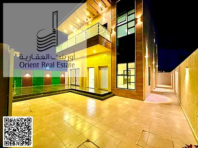 Villa for sale in Ajman, Al Zahia area, including registration and ownership fees. The villa consists of 4 master bedrooms, a council, a hall, with a