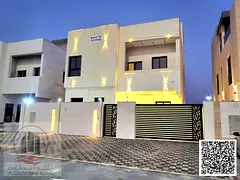 Villa for sale, including registration fees, in Al Bahia, Ajman. 6 master bedrooms, a living room, a