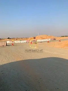 Land for sale in Blida, commercial use. Prime location near a mosque and on the main Al-Maliha Stree