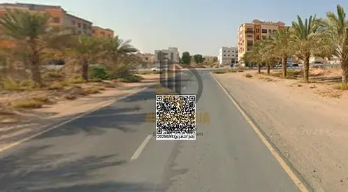 A great investment opportunity to own a residential commercial plot located in Al Mowaihat 2, Ajman, directly on Schools Street, one of the busy stre