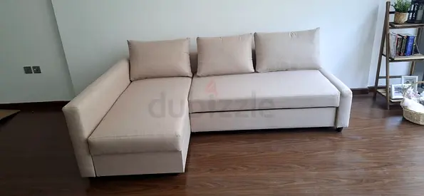 Ikea L shape Beige color sofa with storage