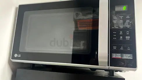 Convection microwave oven with grill option