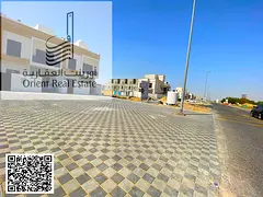Villa for sale in Ajman, Al Helio 2 area. The villa consists of 4 master bedrooms, a majlis (formal