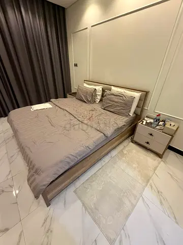 Selling Great Condition Home Center Bed Set With two side tables and mattresses