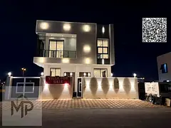 Two-story villa with a rooftop terrace for sale, located directly behind Al Hamidiya Park. Luxurious