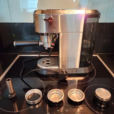 Sleek DeLonghi Espresso Maker - Perfect for Coffee Lovers!