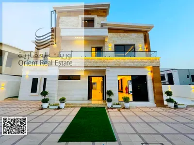 Villa for sale in Ajman, Al Yasmeen area, consisting of 8 master bedrooms + 10 bathrooms, a large kitchen, a fitted kitchen, a roof, a maid's room, an