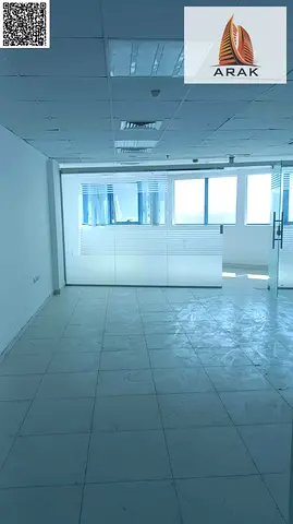 A spacious office is available for rent in Falcon Towers located in Al Rashidiya 2, a prime commercial location