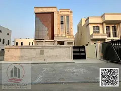 Villa for sale, including registration fees, in Ajman, Al Alia area. 6 master bedrooms with a roof a