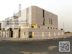 Corner villa for sale in Ajman, Al Helio 2 area, including registration fees, consisting of 5 master