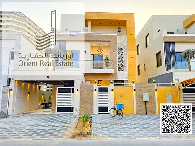 Villa for sale in Ajman, Al Helio 2 area, including electricity, water and air conditioning, consisting of 5 master bedrooms with a swimming pool, a m