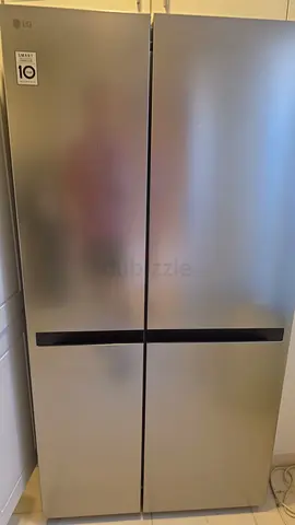 LG Refrigerator like new with under warranty perfect working