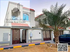 Villa for sale in Ajman, Al Helio 1 area. The villa consists of 4 master bedrooms, 2 living rooms, a