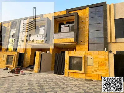Villa for sale in Ajman, Al Helio 2 area. The villa consists of 5 master bedrooms, a majlis (formal sitting room), a living room, and a maid's room. F
