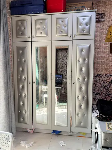 Bed and cupboard set