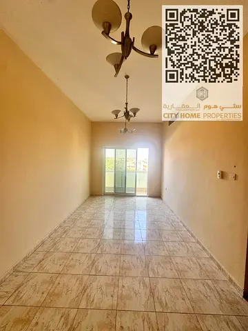 For annual rent, a spacious 2-bedroom apartment with a hall located in Al Rawda 3, Ajman, in a prime location very close to the Dubai exit, providing
