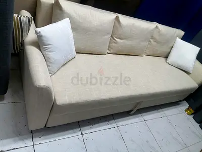 Comfortable Beige Sofa with Cushions
