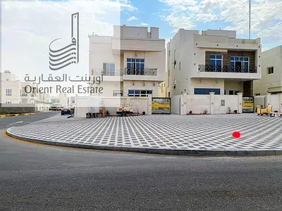 Villa for sale in Ajman, Al Helio 1 area. The villa consists of 5 master bedrooms + a living room, 2 halls, a maid's room including air conditioning.