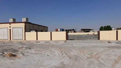 27700 SQRFT OPENT YARD AVAILABLE FOR RENT WITH SEWA BOUNDRY 2 OFFICE WASHROOM KITCHEN NEAR CEMENT FACTORY NEXT TO HUMPEL PAINTS IN CERAMIC STORES AREA