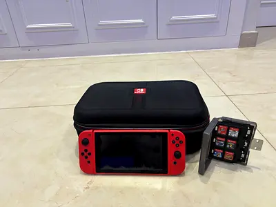 Nintendo Switch Bundle with Carrying Case and Game Cartridges