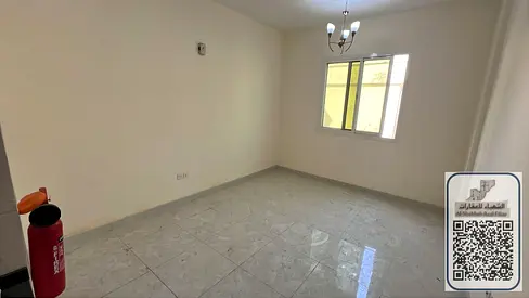 Studio apartment for annual rent in Al Rawda, large space, on the Sharjah and Dubai exit