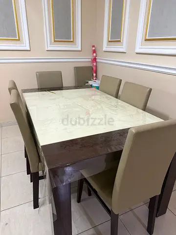 Stylish Dining Table with Chairs