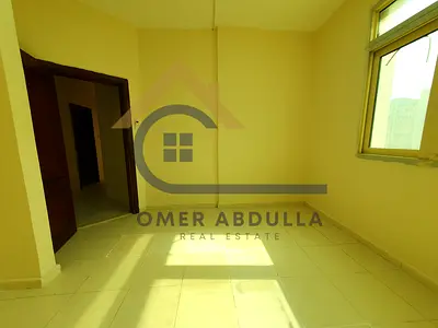 NO DEPOSIT CASH 1BHK WITH CLOSE HAL ON ROAD BUILDING IN MUWAILEH