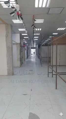 فرصة ذهبية في السوق الرئيسي | مستودع شاغر ومجهز بمساحة 13000 قدم مربع للإيجار | المنطقة الصناعية السادسة | الاسبقية بالحجز