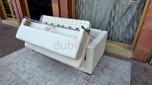 Almost perfect brand new condition natuzzai Italian comodo sofa bed